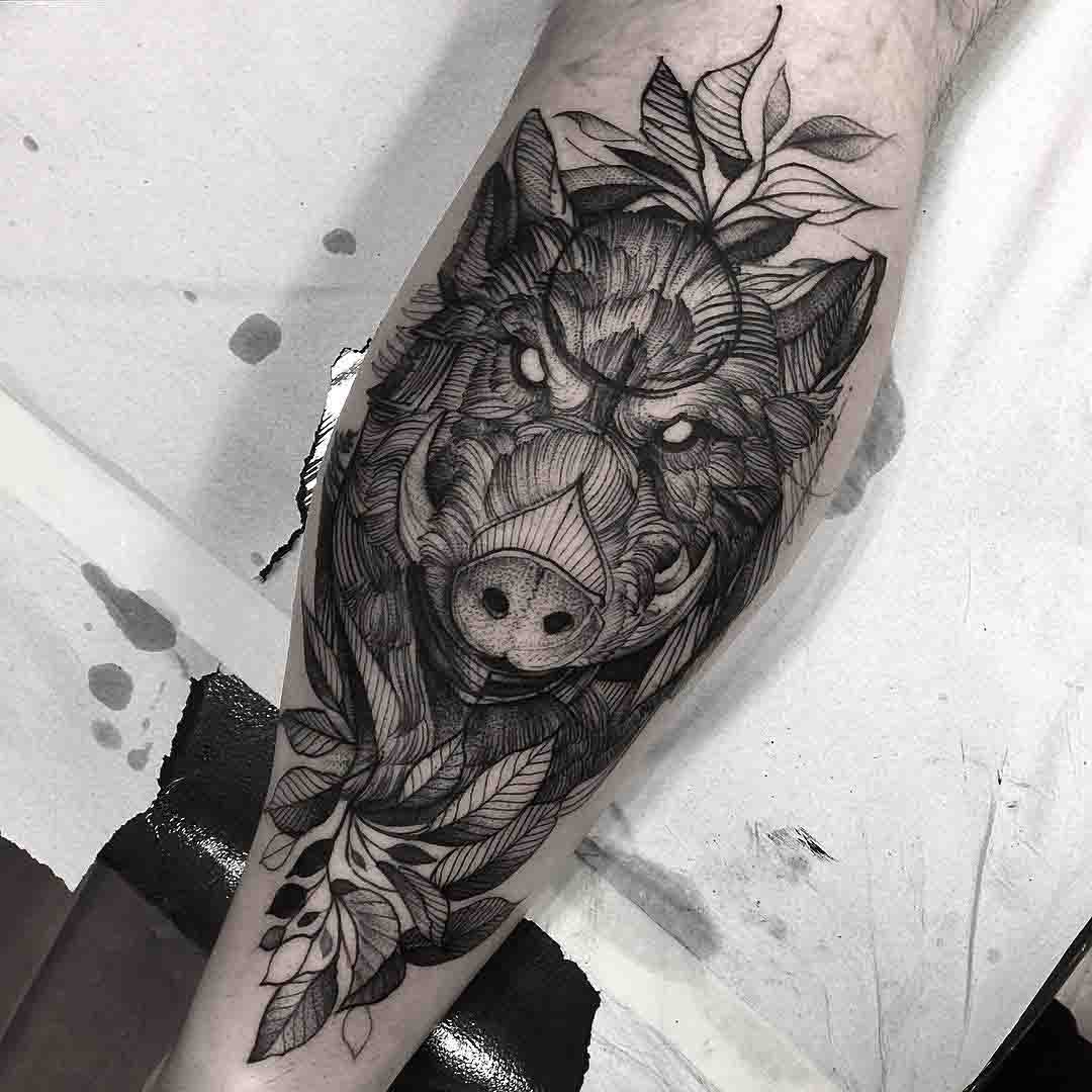 boar tattoo on calf