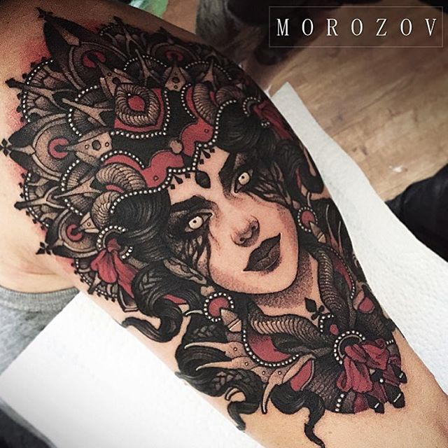 neo-traditional girl face tattoo on shoulder