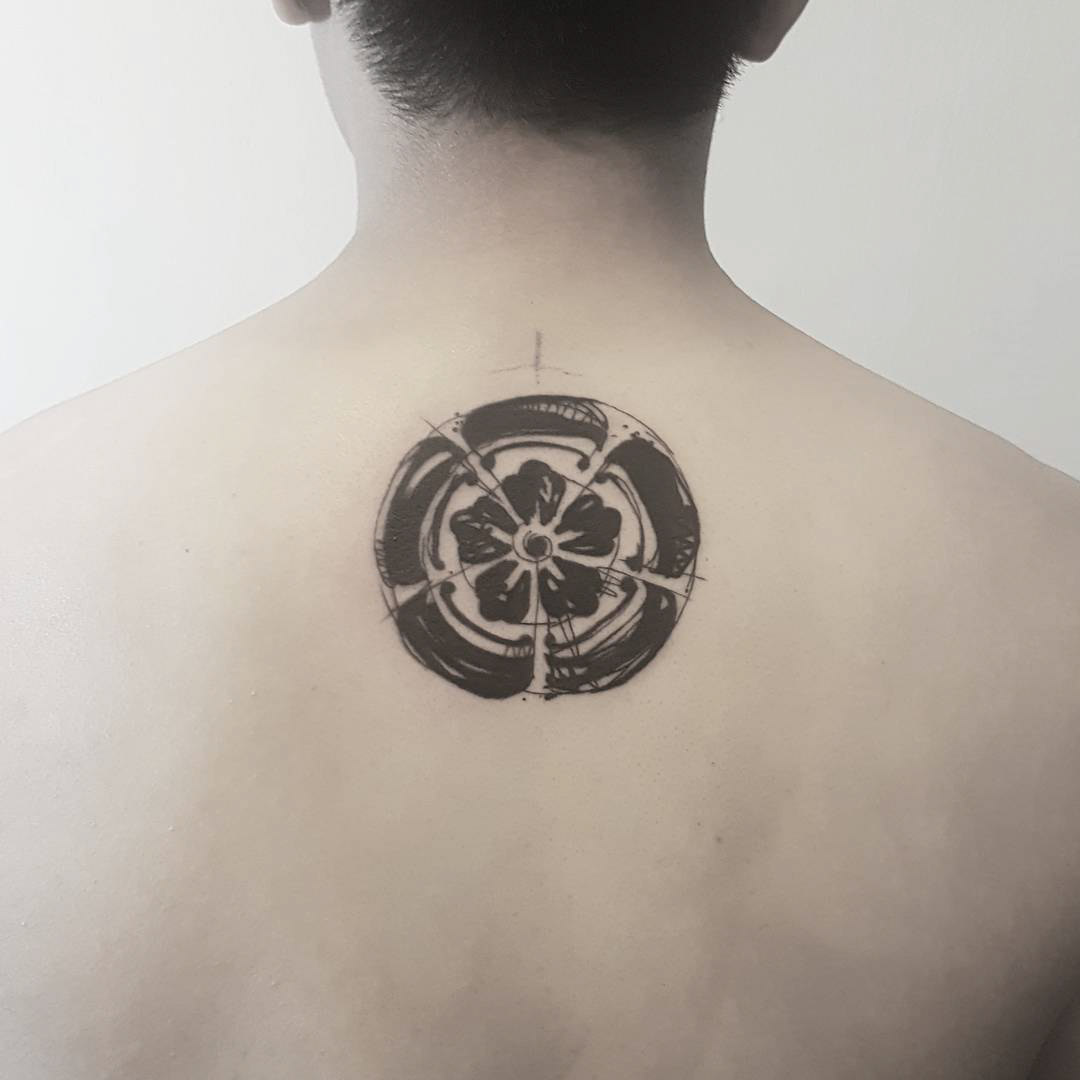 back tattoo circle markered