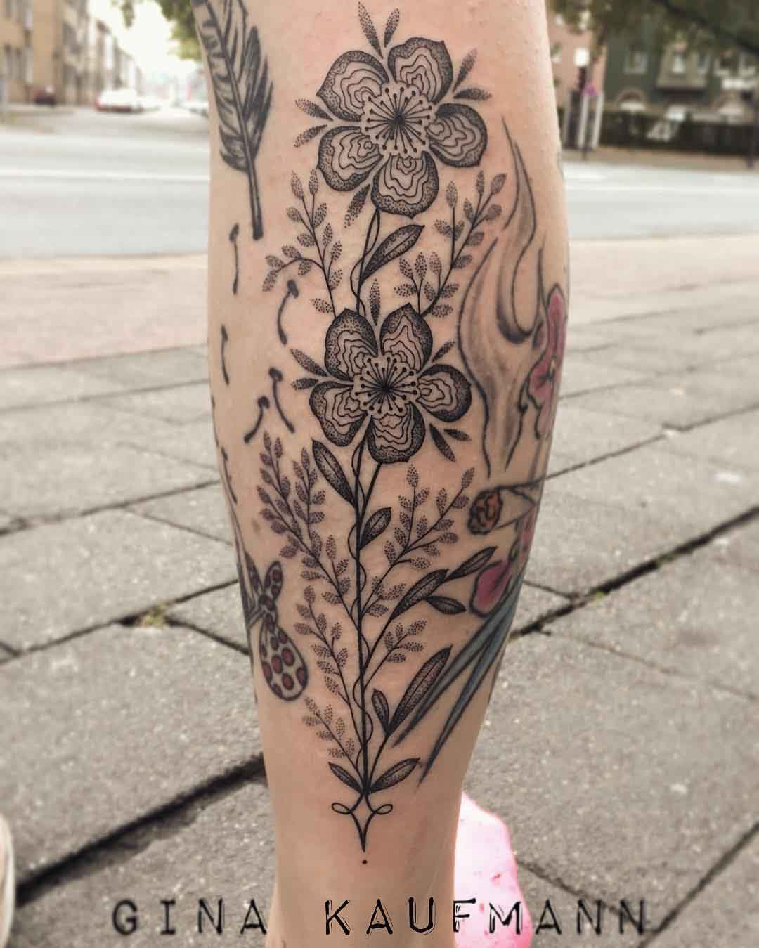 Flower and rhombus tattoo on the calf  Tattoogridnet