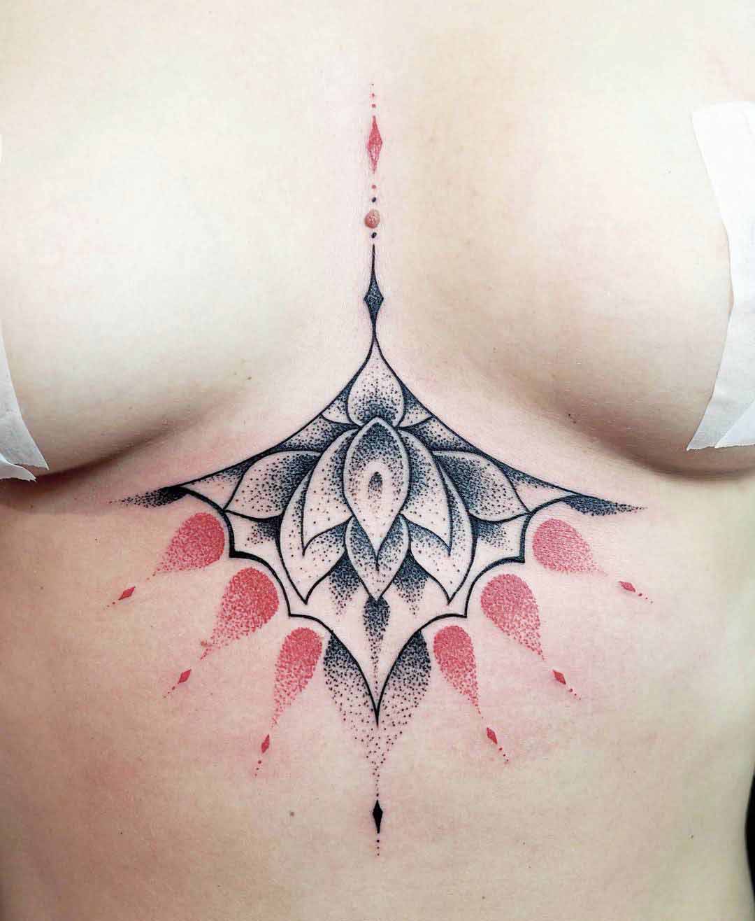 dotwork tattoo under breast