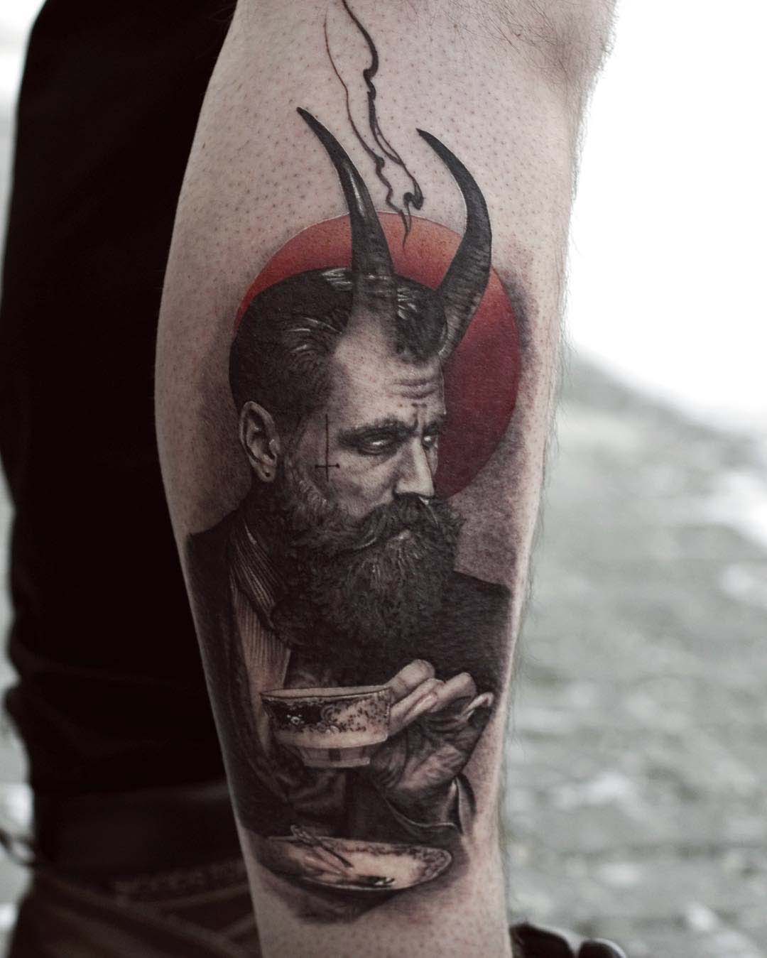 calf tattoo devil man
