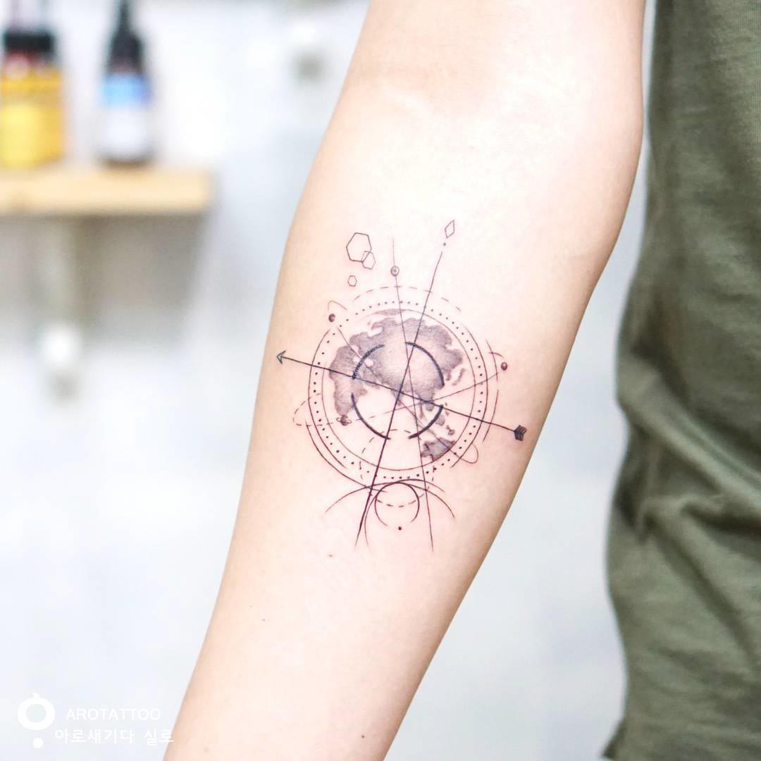 geometrical world map tattoo on bicep