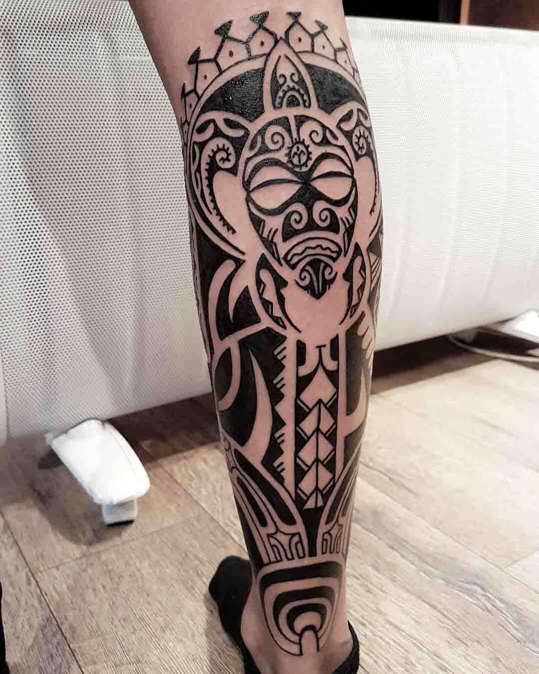 Polynesian tattoo on calf