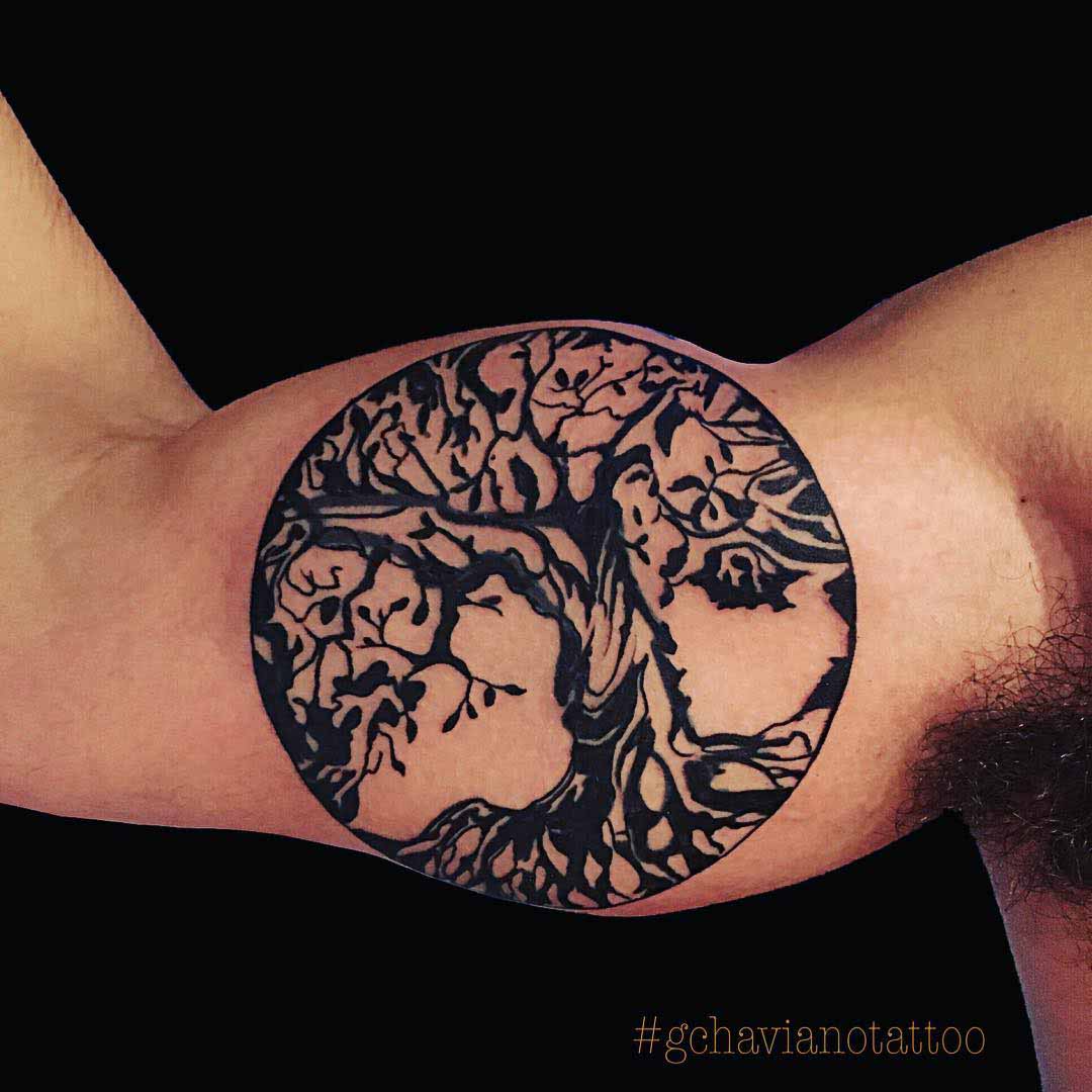 bicep tree tattoo black