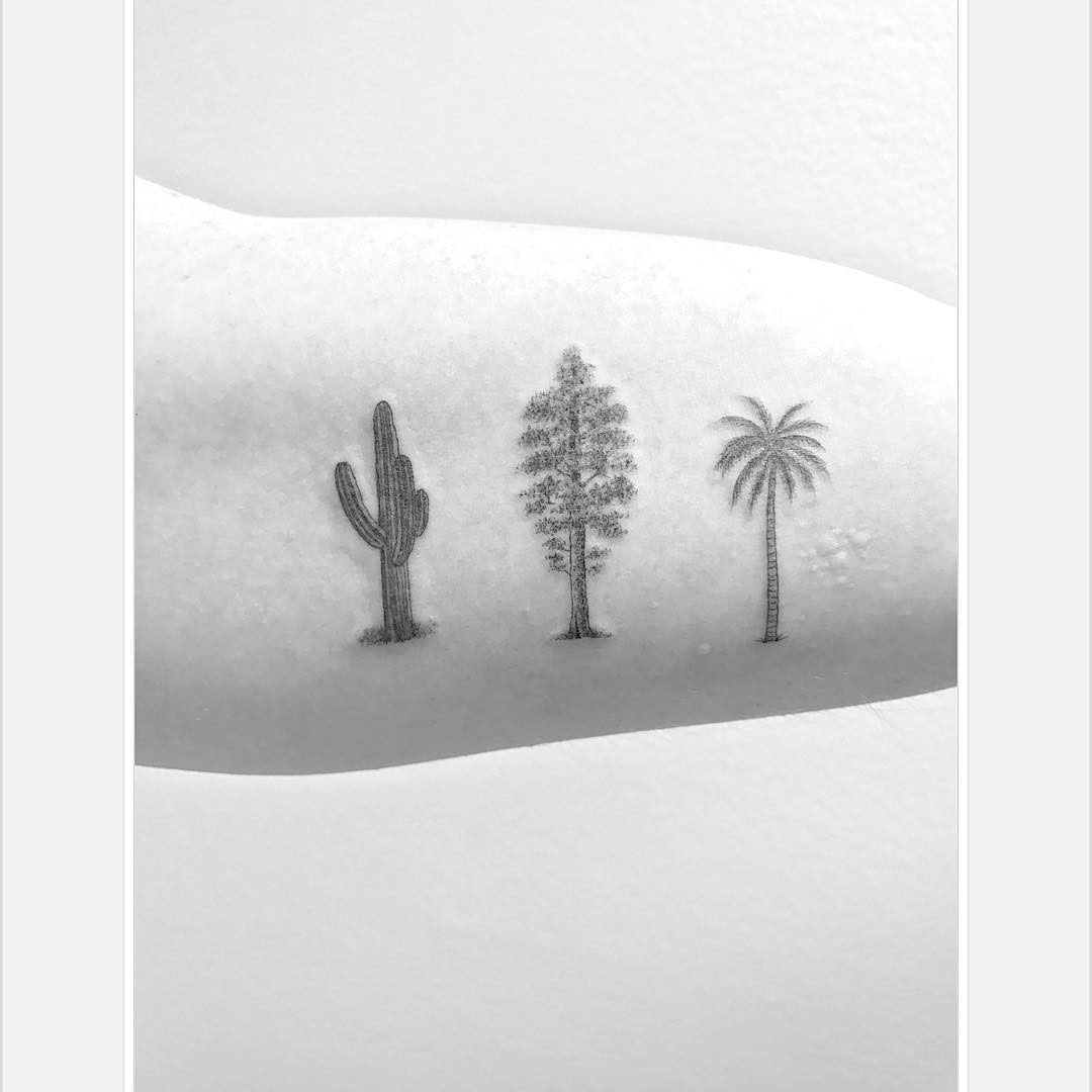 bicep tattoo trees