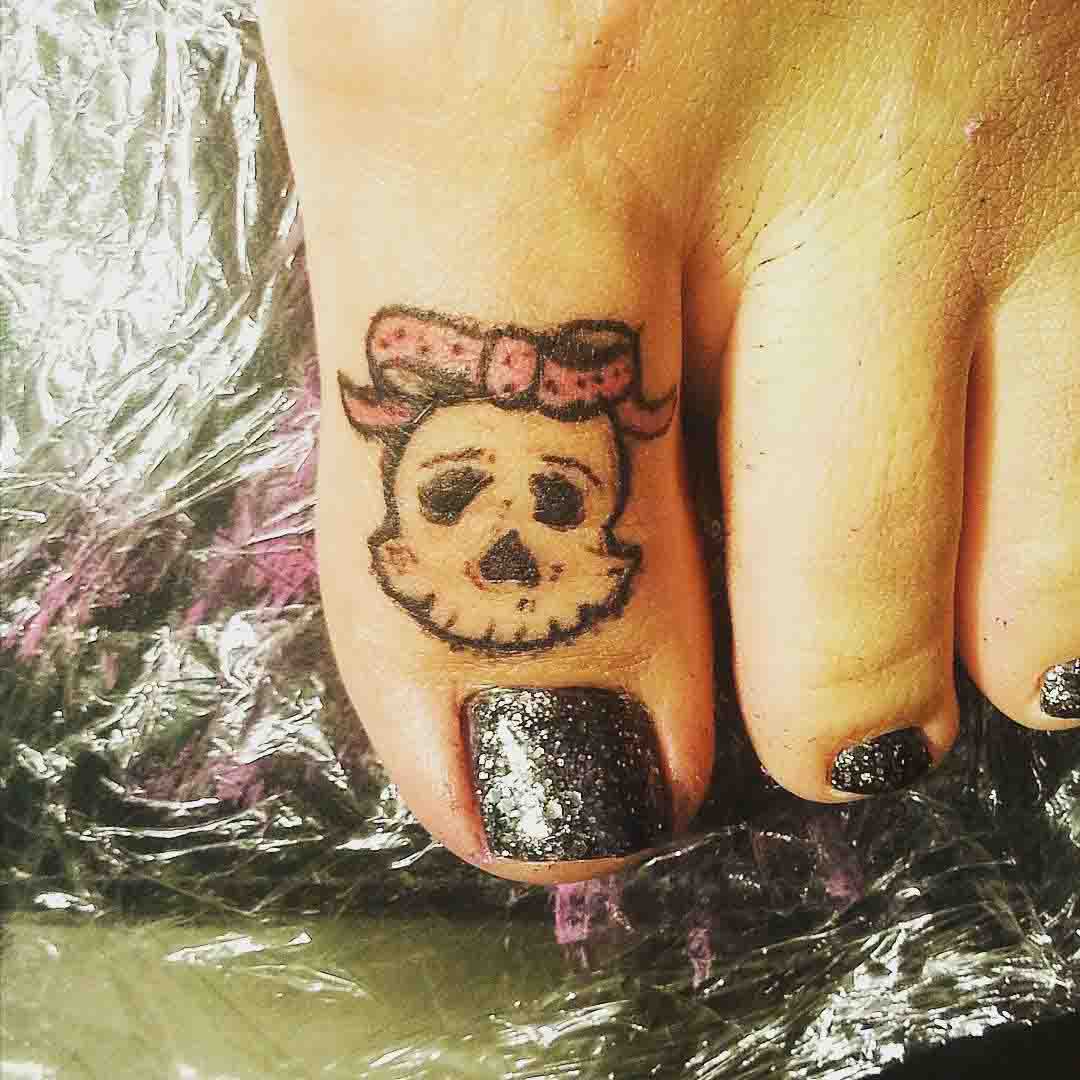 Girl Skull Tattoo on Toe by Gold Star Tattoo