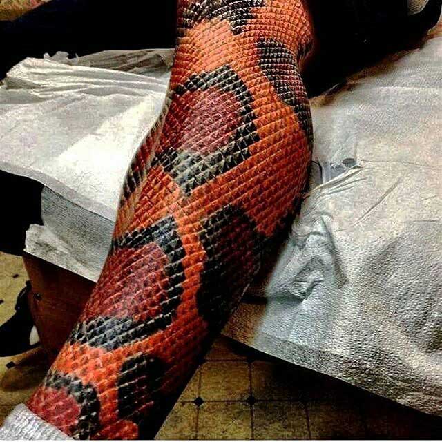 snake skin tattoo on leg