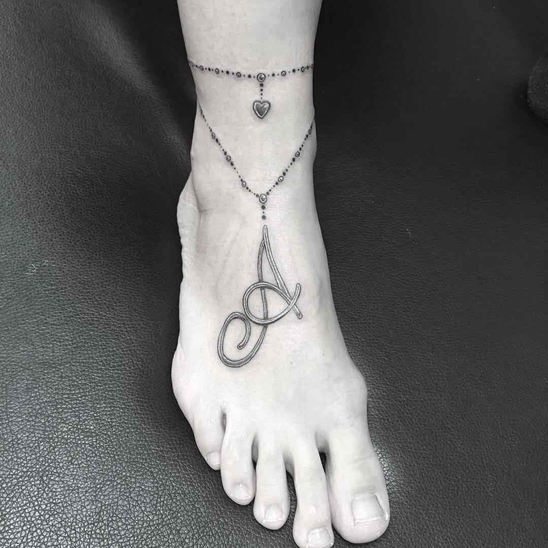 ankle tattoo necklace on foot
