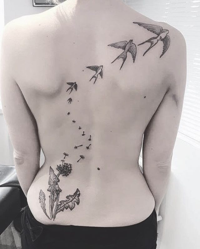 back tattoo girl swallows