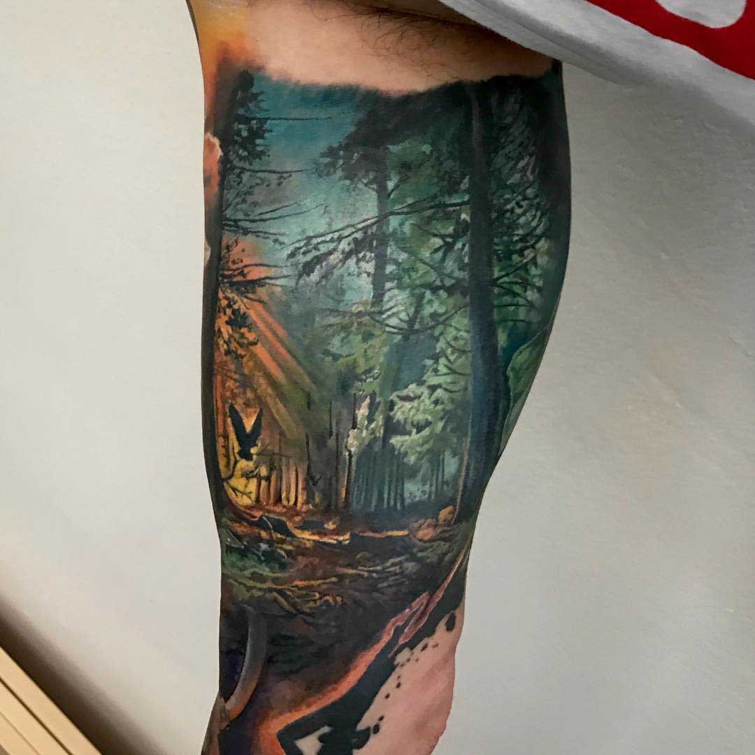 bicep tattoo forest realistic