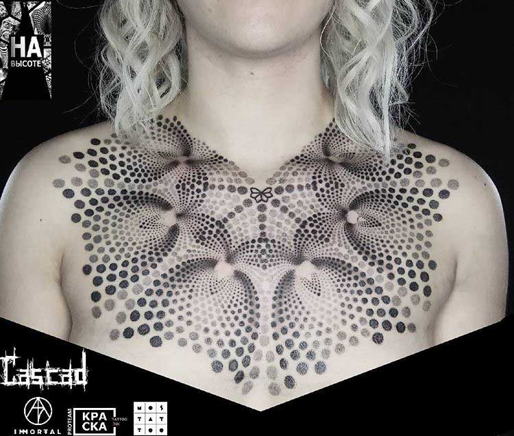 dotwork tattoo on chest and collar bone