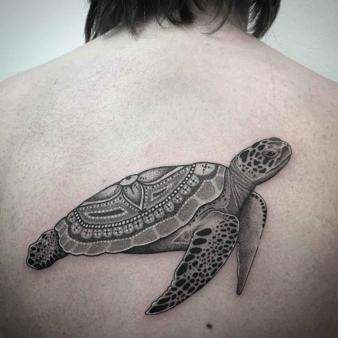sea turtle tattoo on back