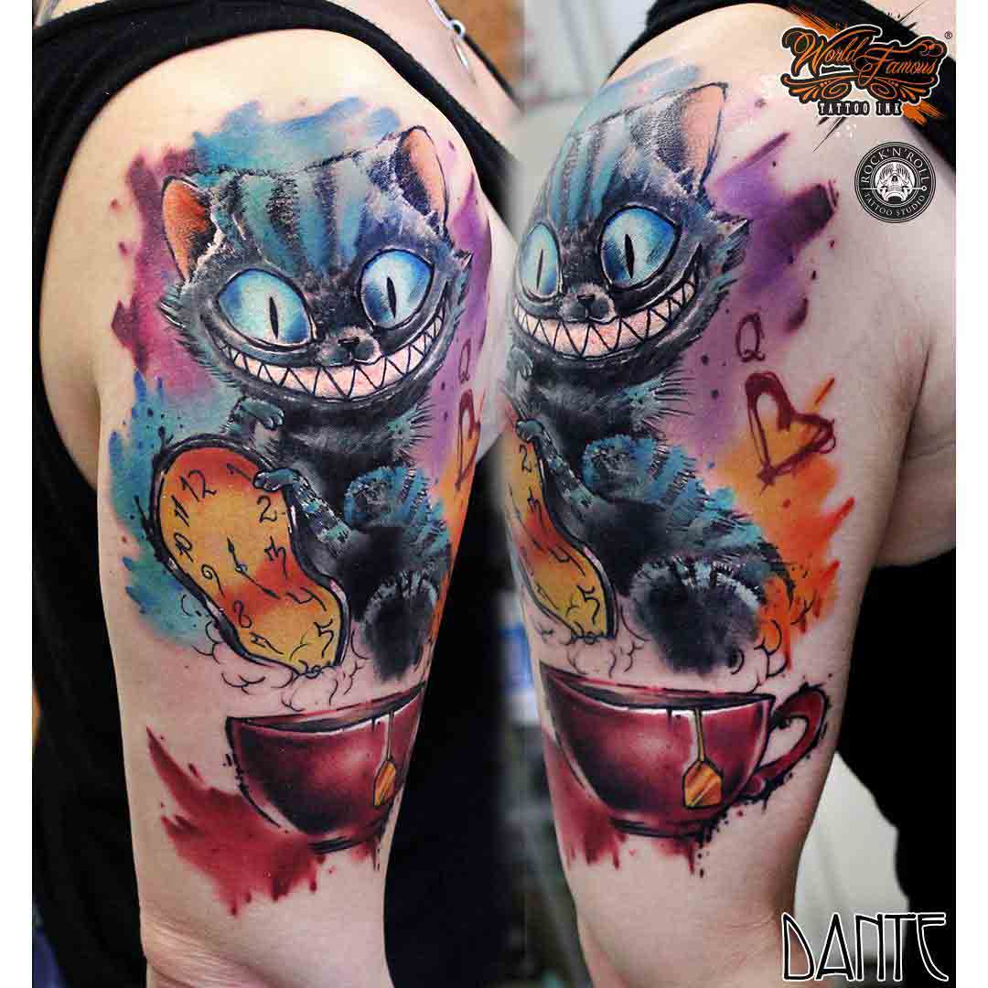 shoulder tattoo watercolor cheshire cat