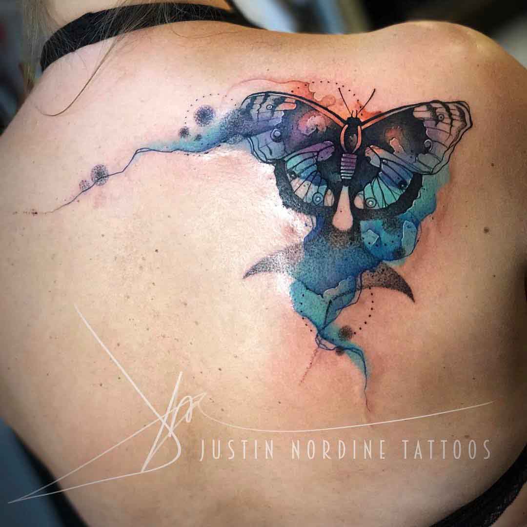 butterfly tattoo on shoulder blade watercolor style