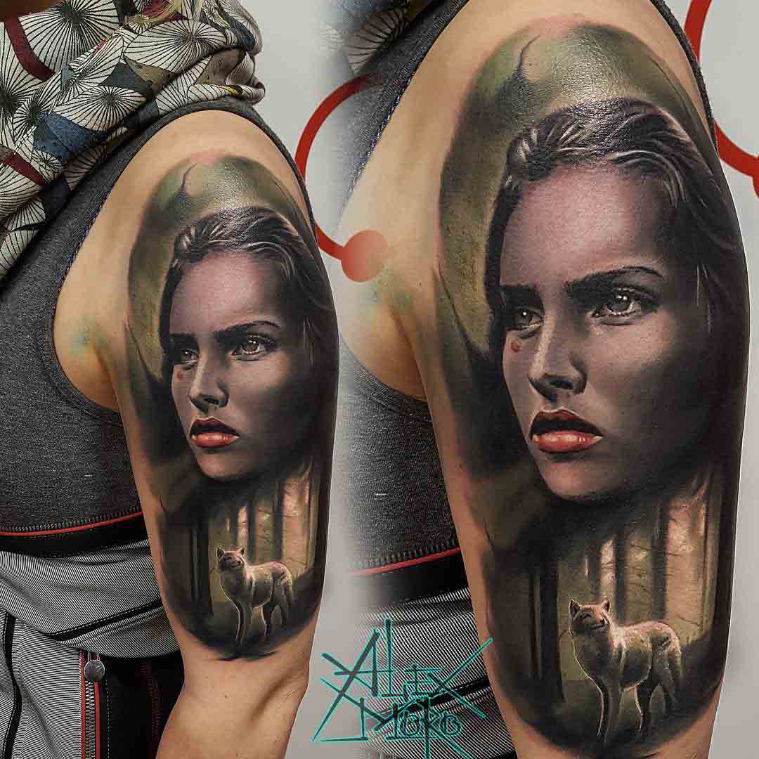 shoulder realistic tattoo portrait with wolf