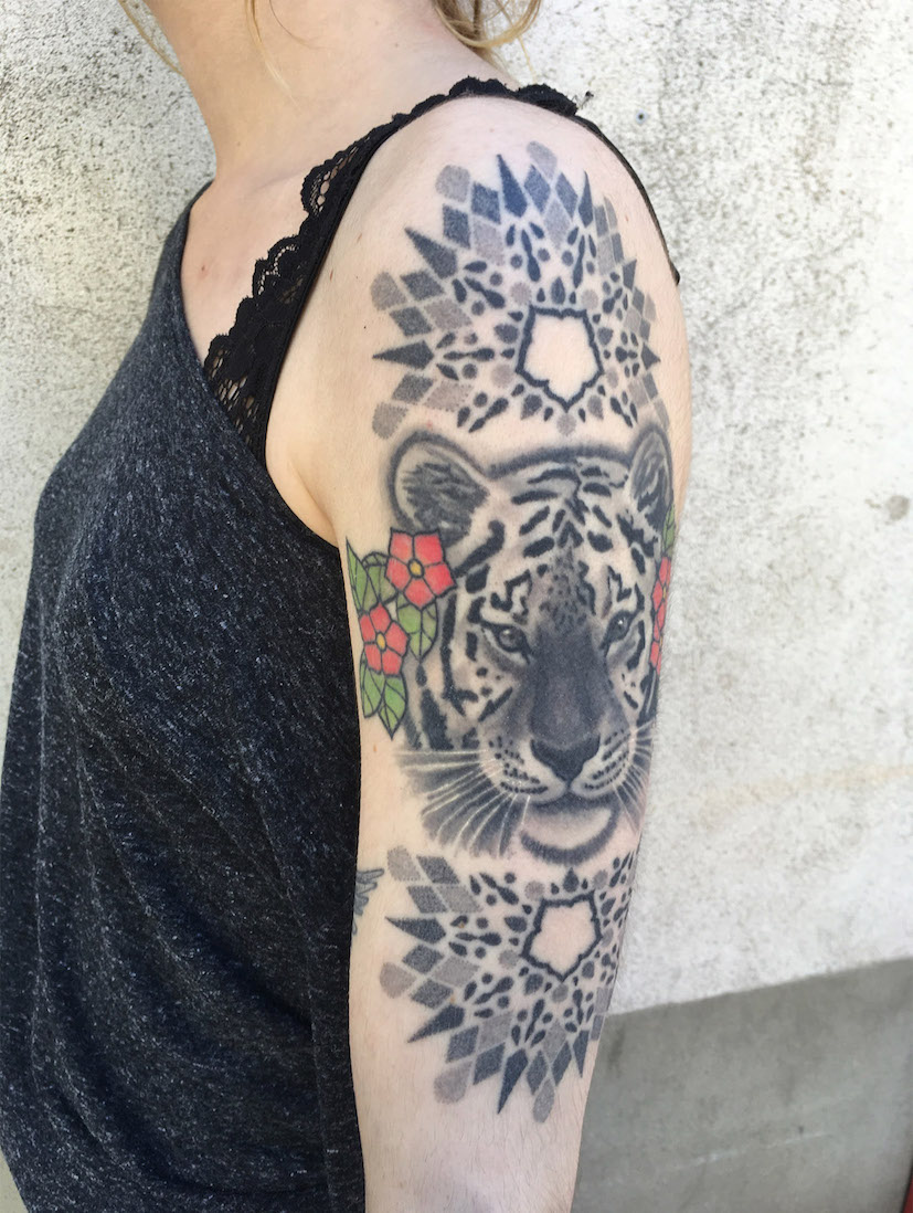 mandala and tiger tattoo on shoulder