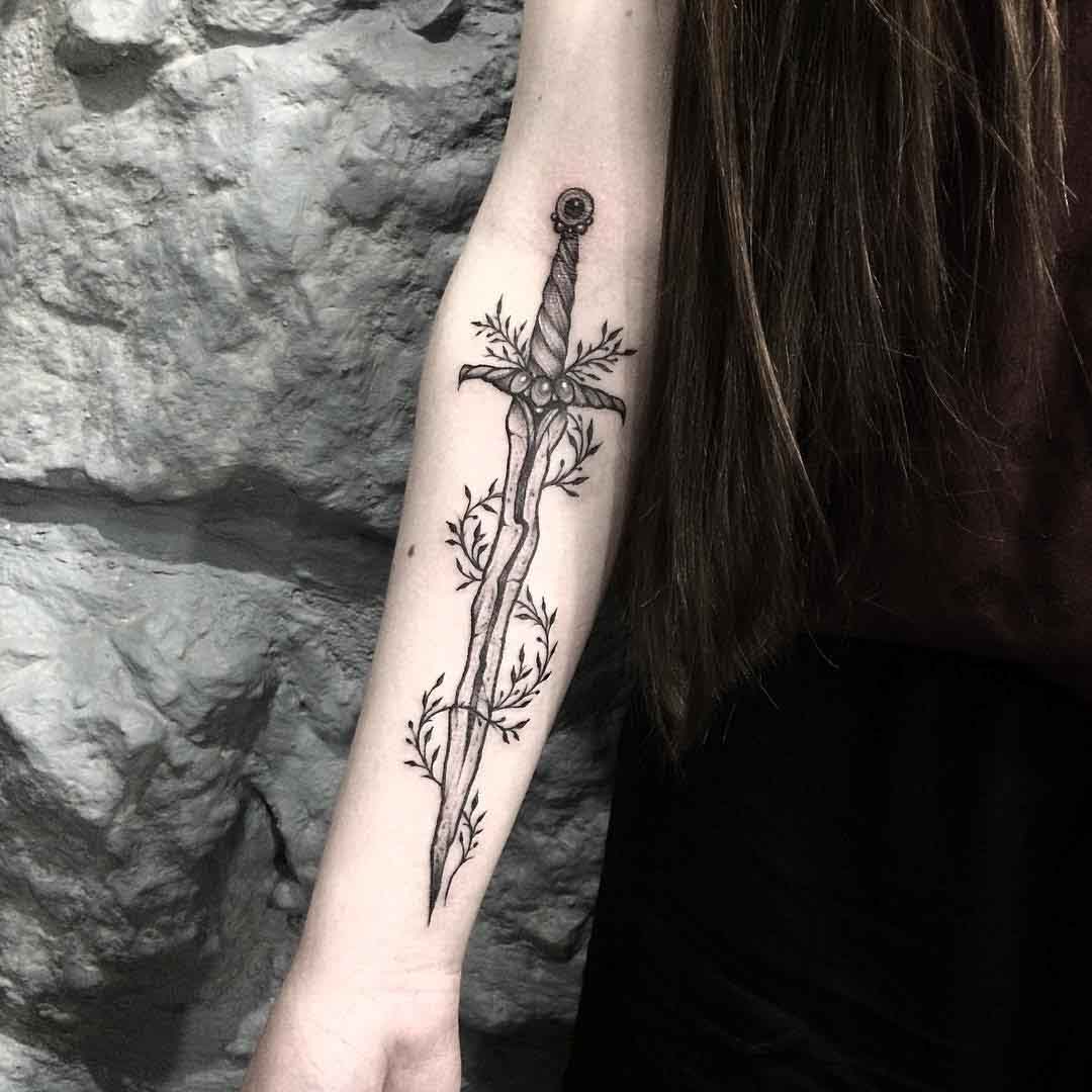 arm tattoo dagger