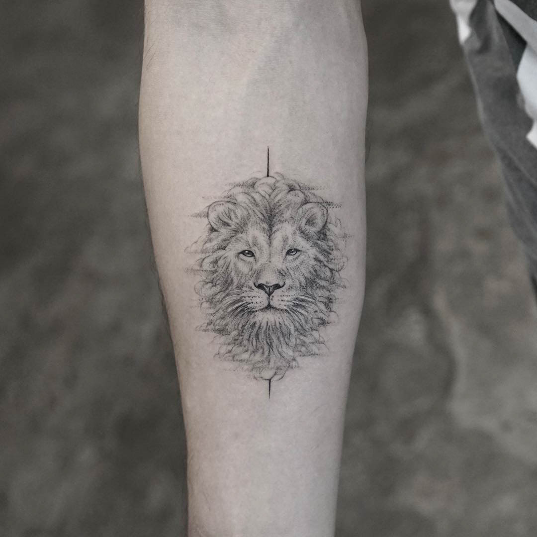 arm tattoo lion head
