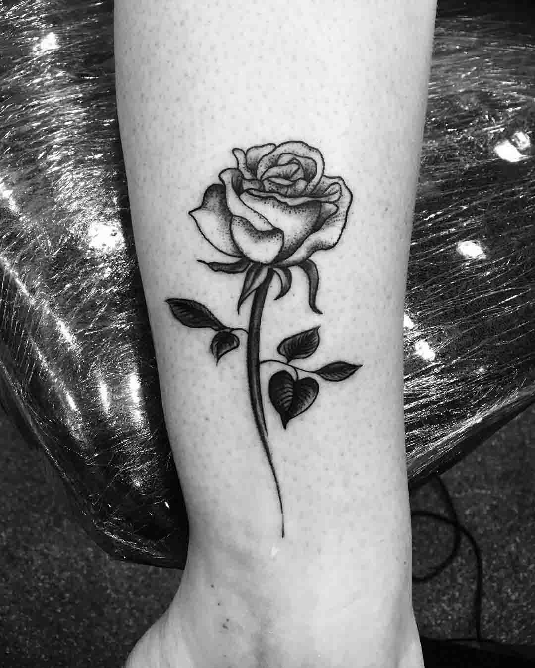 rose tattoo on ankle