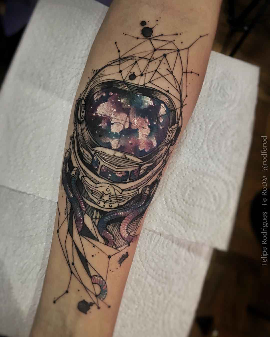 arm tattoo cosmonaut