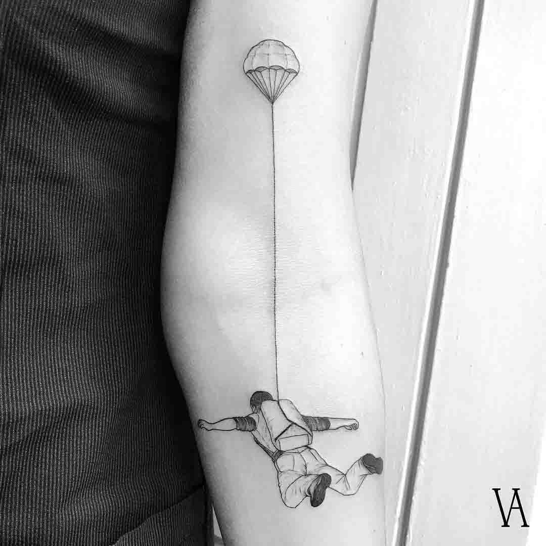 arm tattoo skydiver