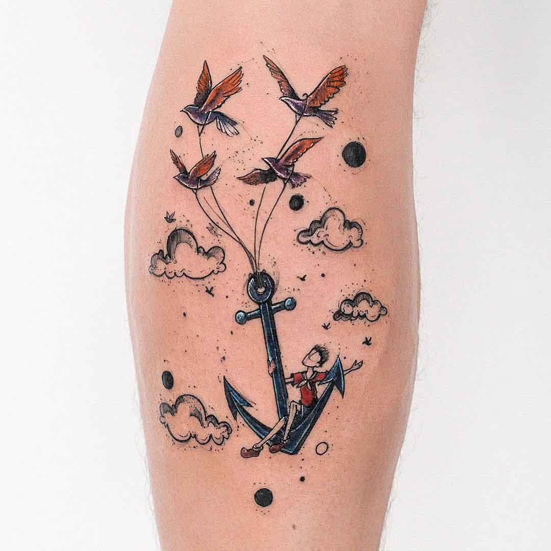 anchot tattoo with birds