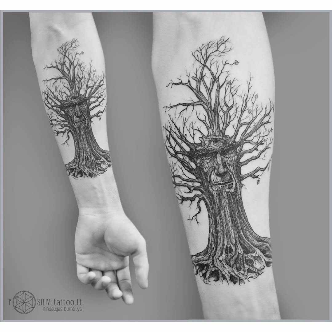 arm tattoo wise old tree