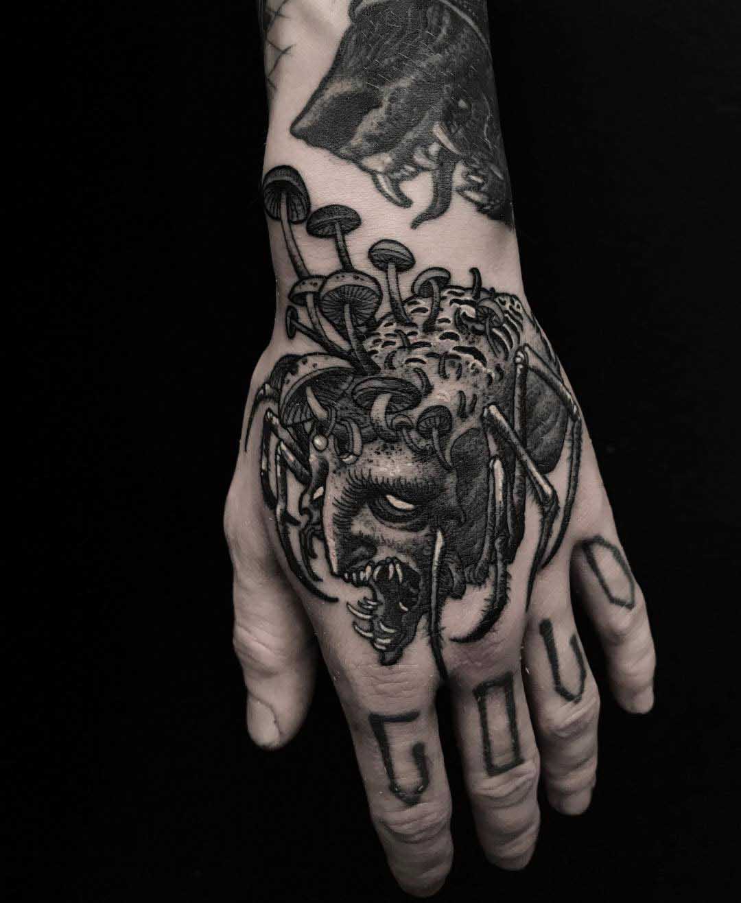 hand tattoo spider monster