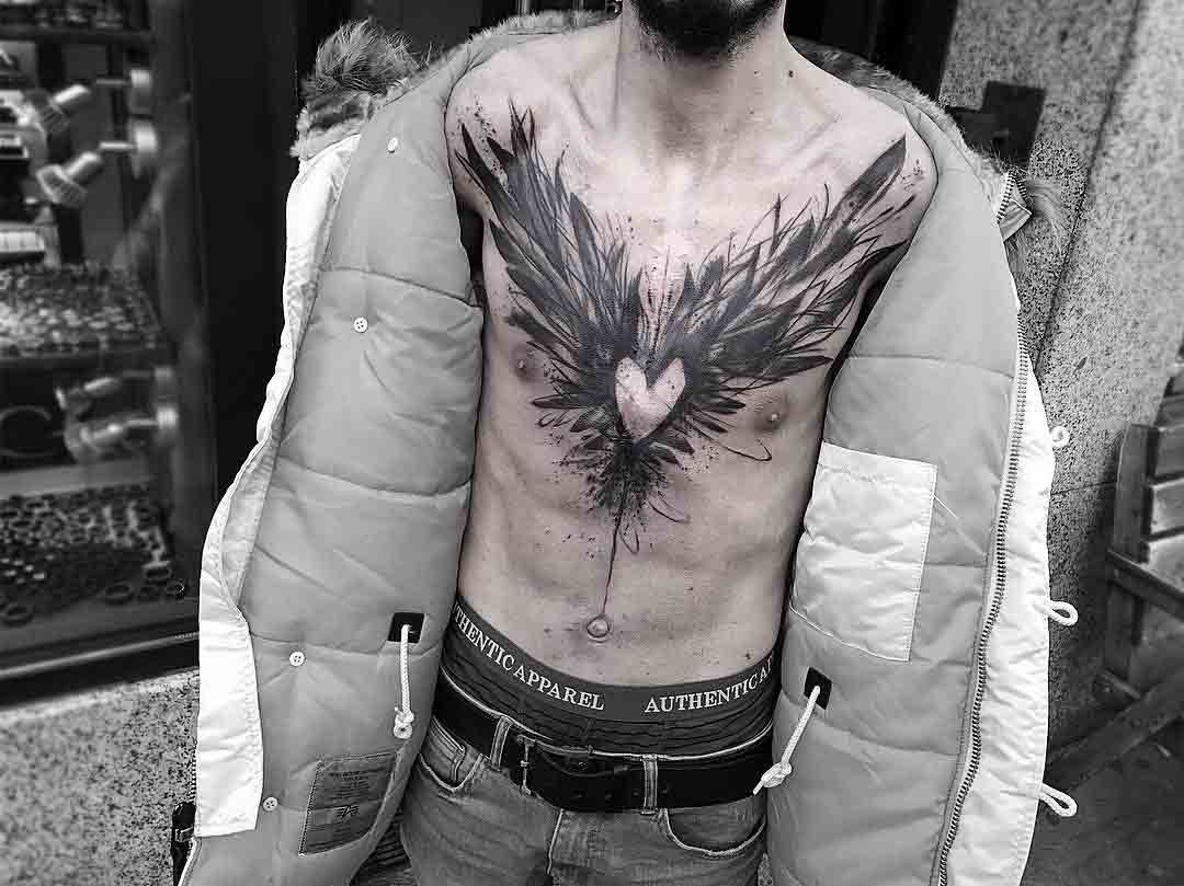 chest tattoo heart with wings