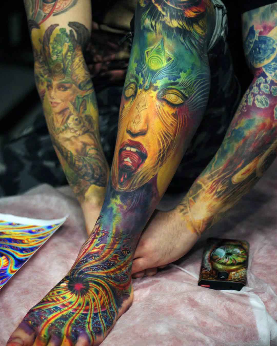 spiritual sleeve tattoo on leg