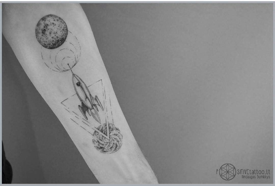 rocket tattoo wormhole and planet