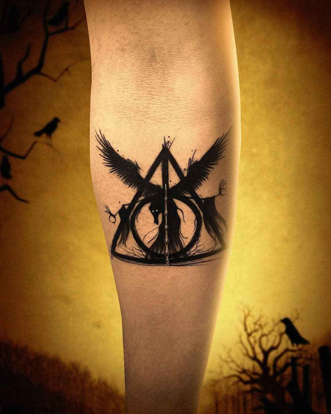 deathly hallows tattoo on arm