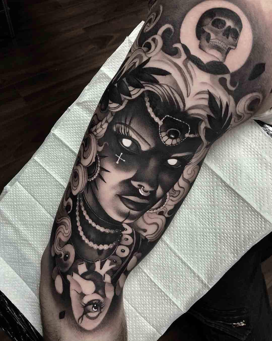 black and grey tattoo sleeve muse
