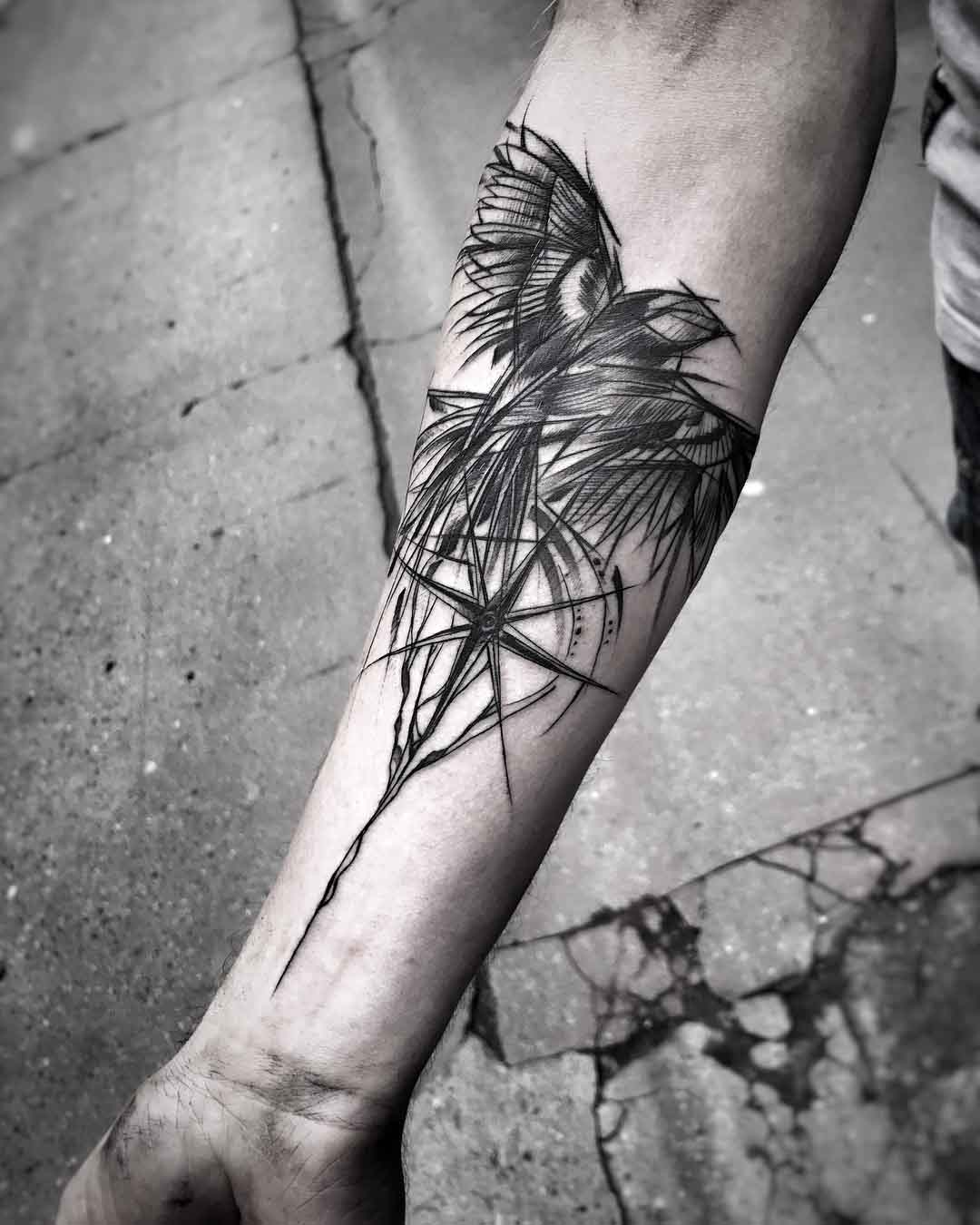 arm tattoo bird and compas sketchy