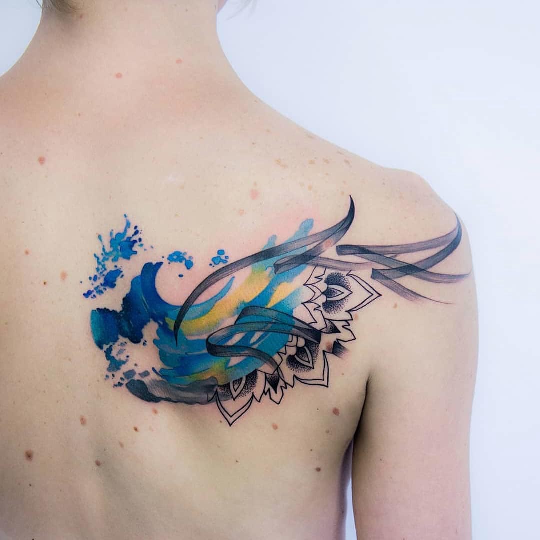 shoulder blade tattoo mandala