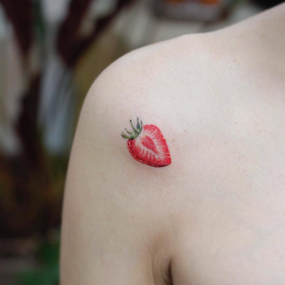 small strawberry tattoo