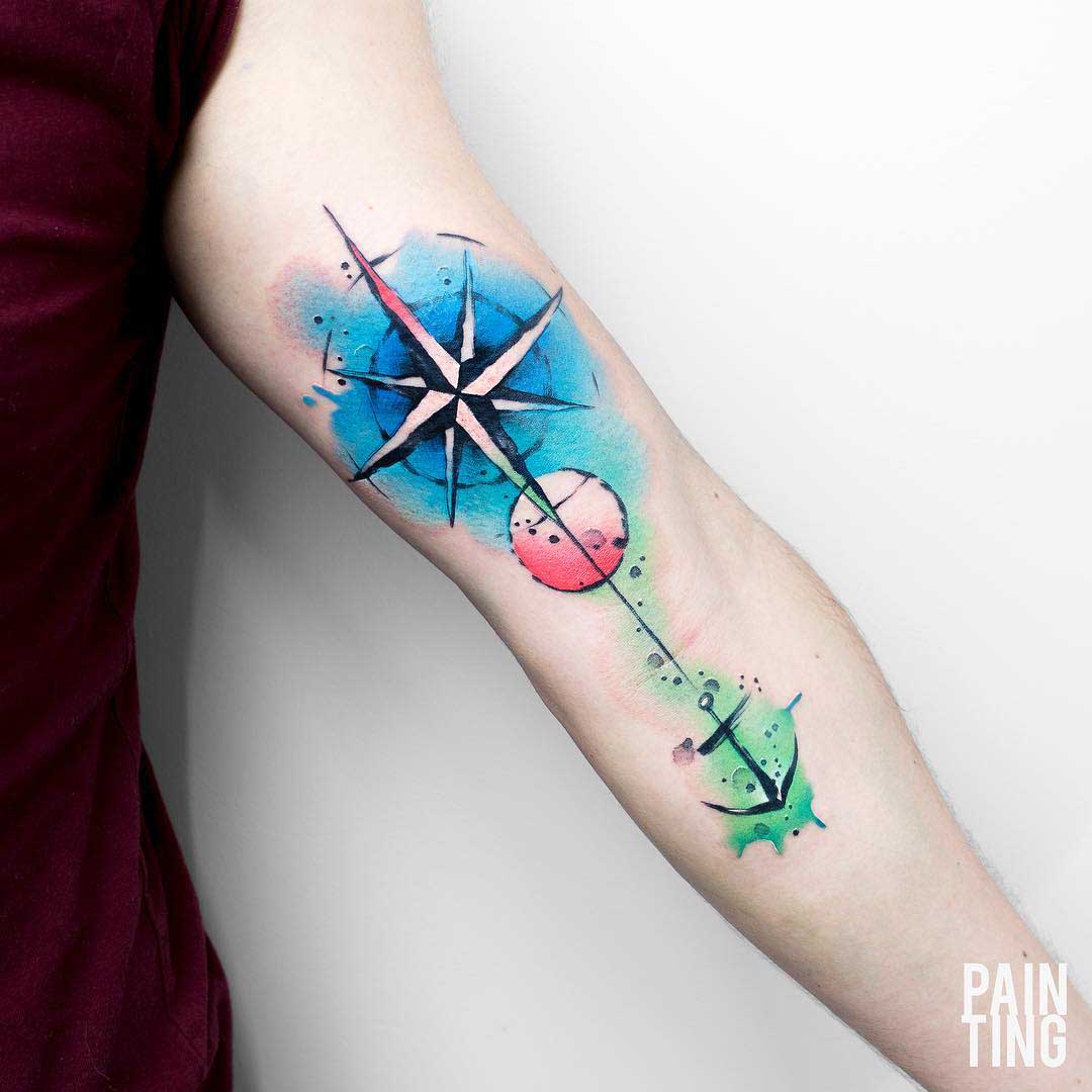 arm tattoo anchor and star