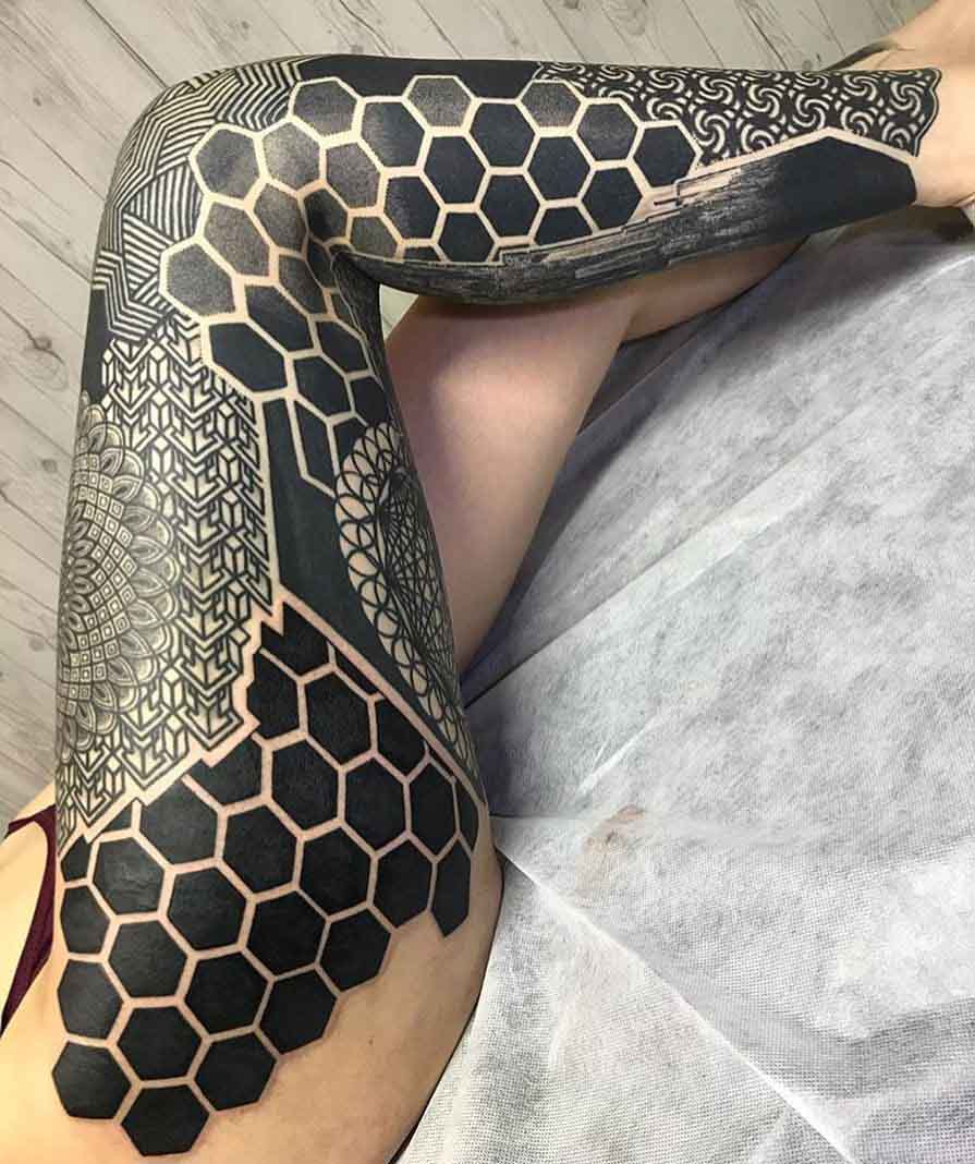 leg tattoo sleeve blackwork