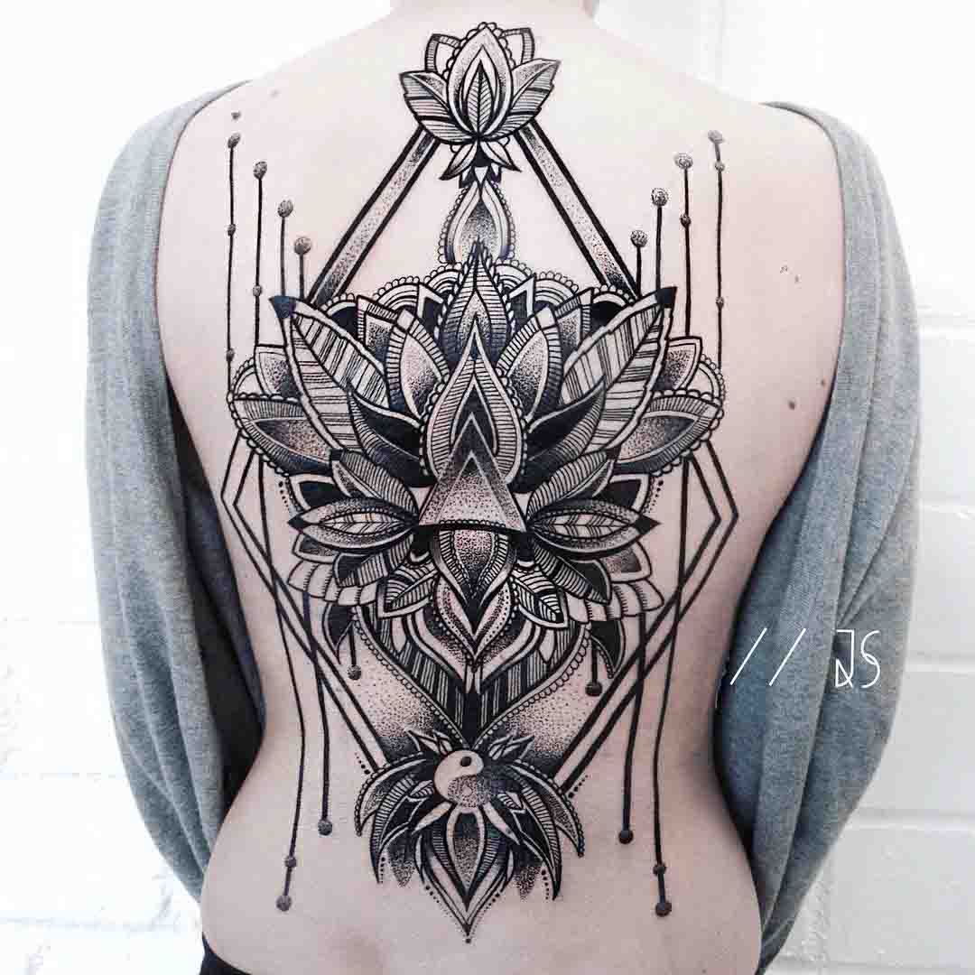 dotwork tattoo lily on back