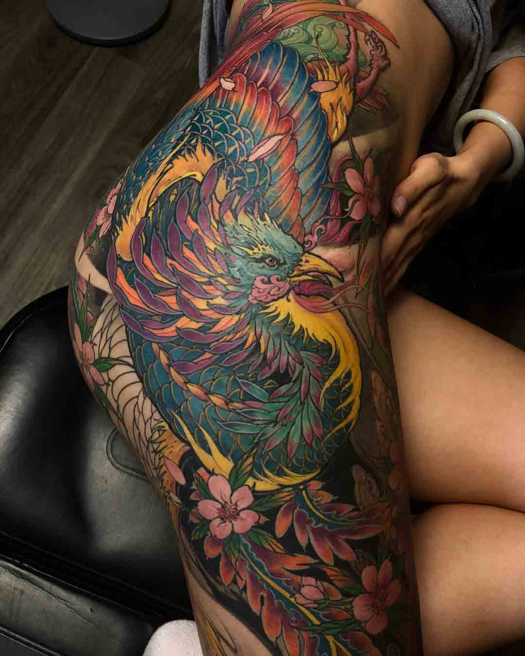hip tattoo peacock