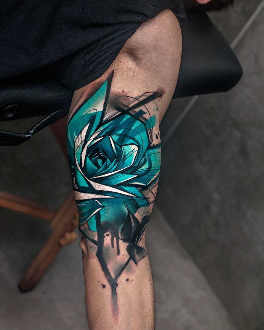 bicep tattoo rose blue