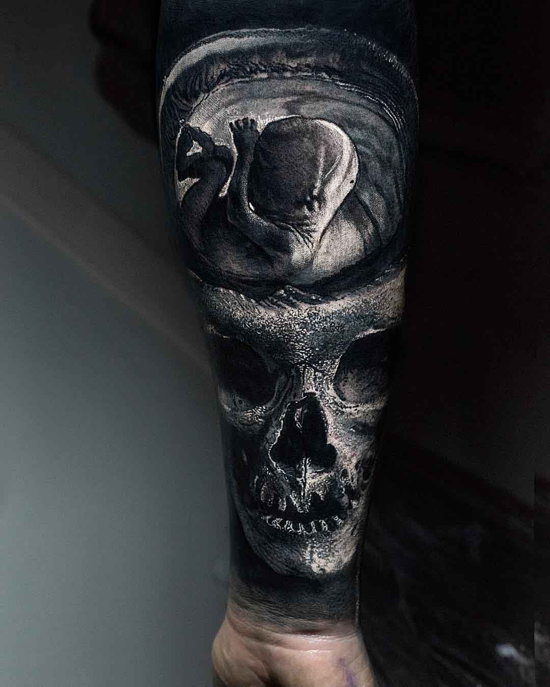 skull tattoo on arm fetus