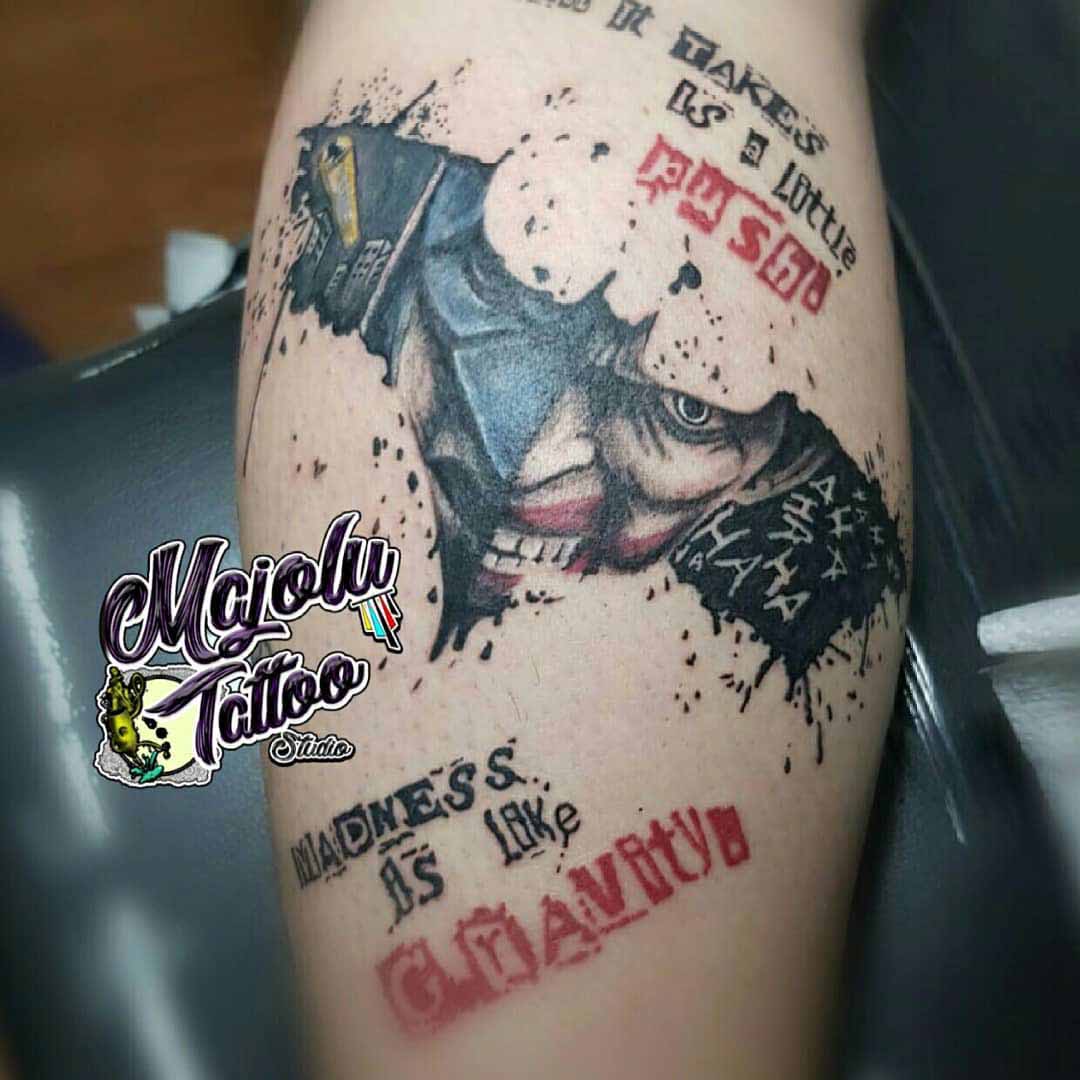 calf tattoo bat sign Joker