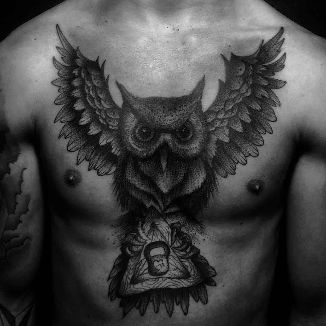 owl tattoo on chest