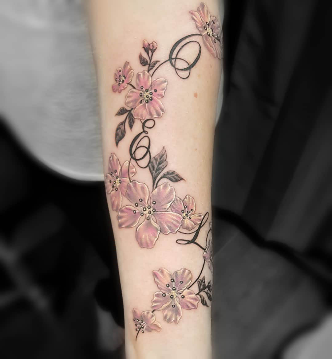 arm tattoo flowers