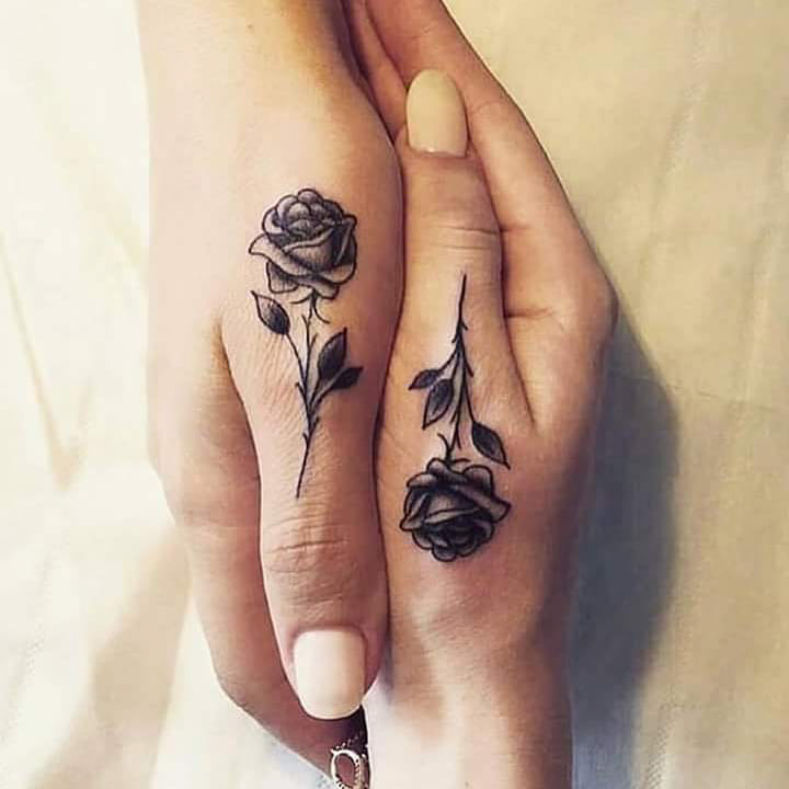 couple tattoo roses