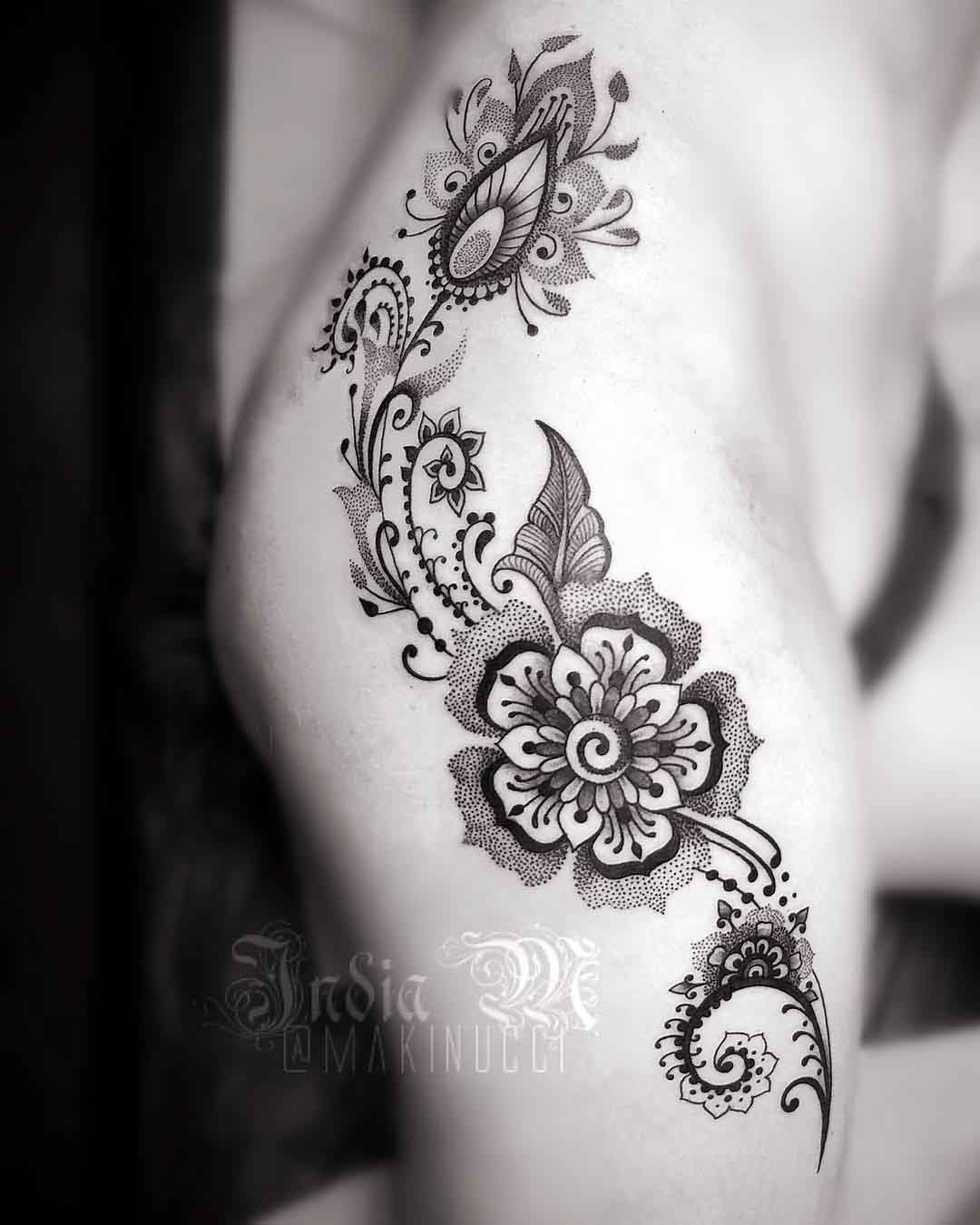 dotwork flowers tattoo on hip