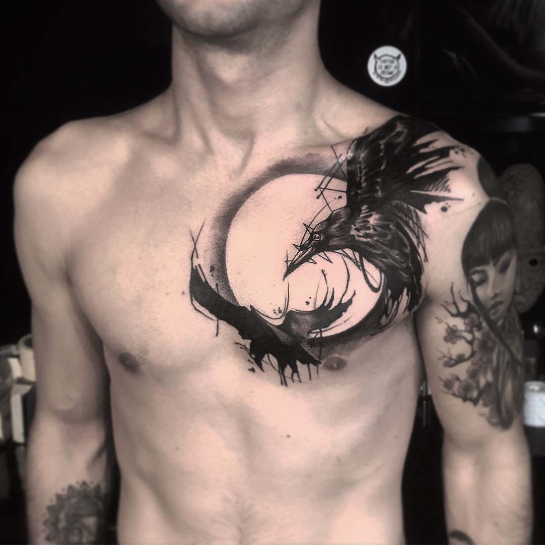 chest tattoo ravens
