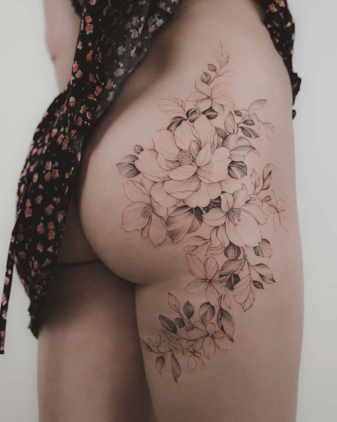 hip tattoo flowers